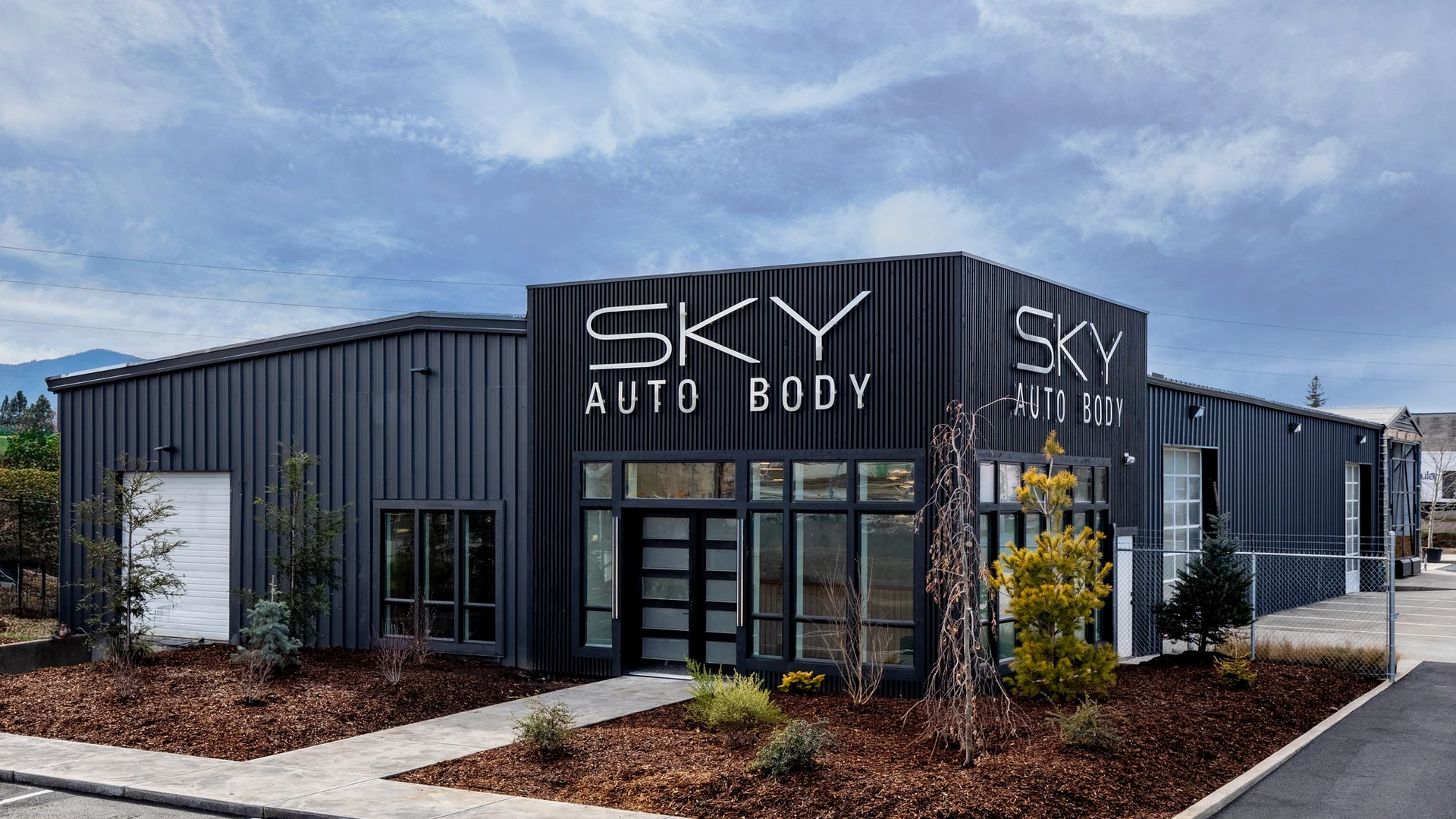 Vehicle in Sky Auto Body's collision repair bay in Medford, Oregon